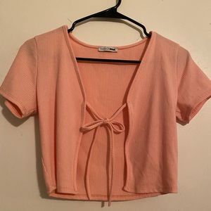 Short sleeved pink tie top